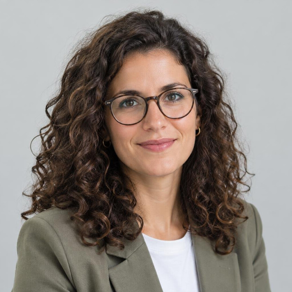 Studio portrait of a Portuguese woman data journalist in her late twenties